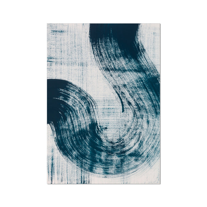 A framed abstract art print featuring swirls of dark blue on a light background.