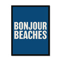 A colourful typography art print with the text 'BONJOUR BEACHES' in bold white letters on a navy blue background, framed on wall with black frame.