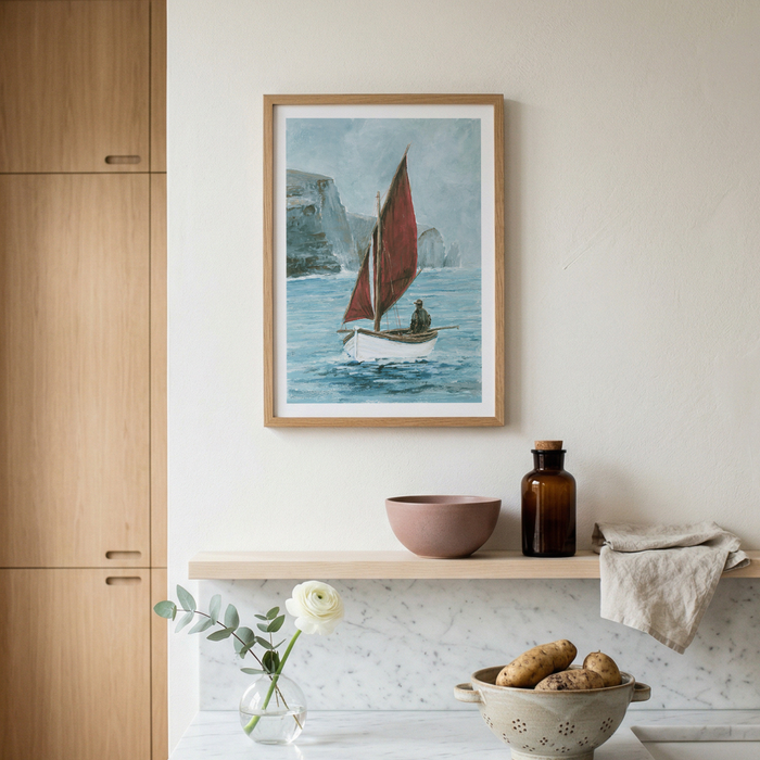 Framed artwork of a sailboat on a wall above a shelf with kitchen items.