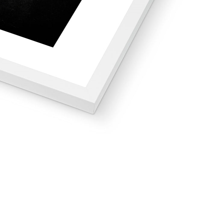 Close-up of a white picture frame corner on a white background