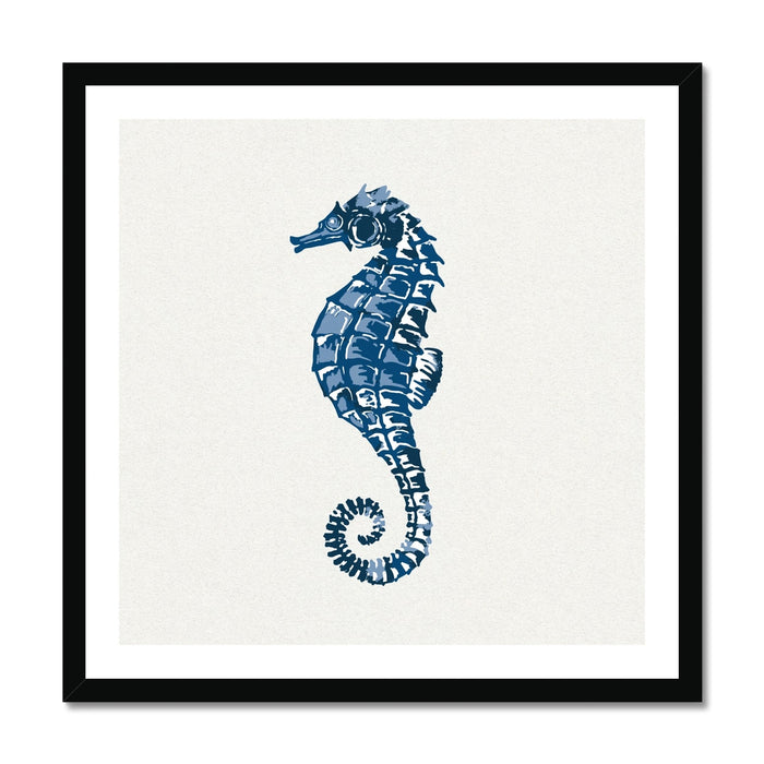 A framed art print of an indigo blue colored seahorse on a white background.