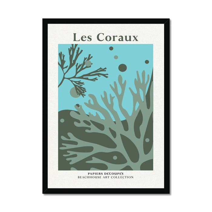Framed green coral artwork of an underwater scene with coral and seaweed, titled 'Les Coraux'.