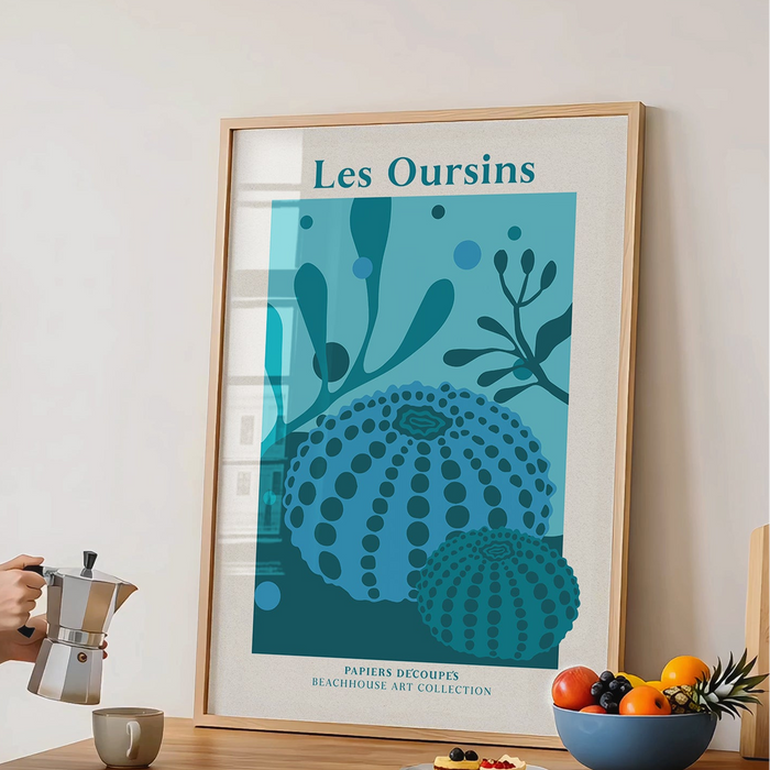Blue sea urchin and seaweed art print on kitchen counter.