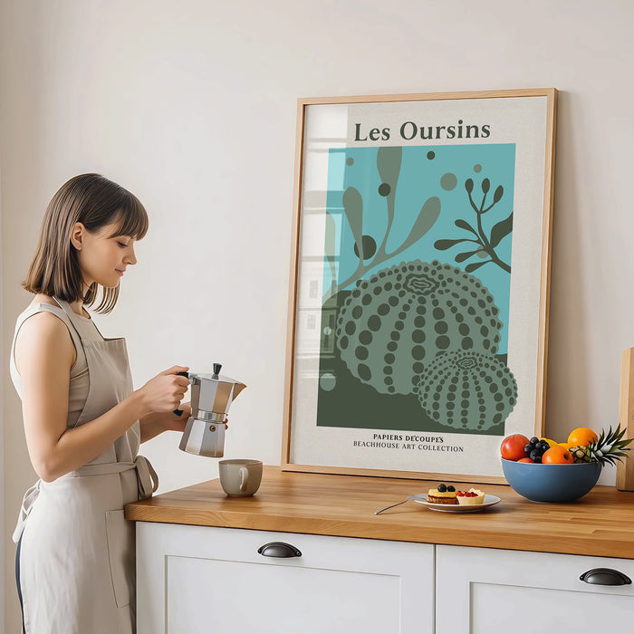 Green sea urchin and seaweed art print with woman making coffee in a kitchen.