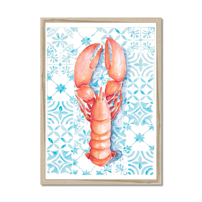 A framed art print featuring a watercolor painting of a lobster on a blue patterned tile background.