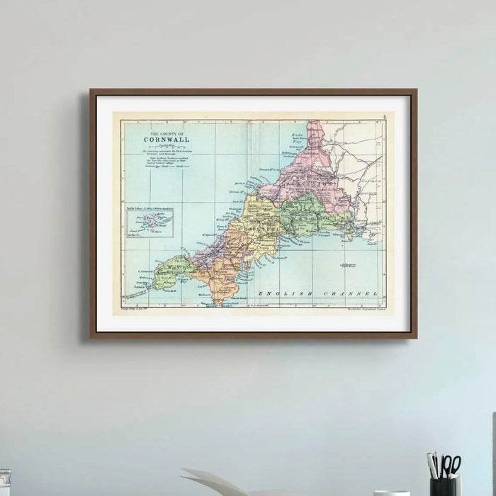 Framed vintage map print of Cornwall showing the full county coastline in soft historic colours.