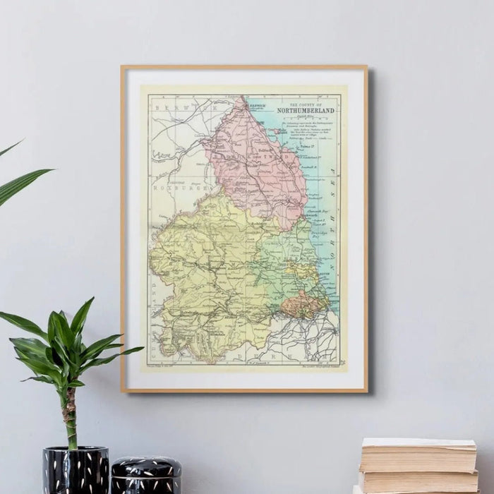 Vintage Northumberland map print showing the county with coloured regions and detailed historic cartography.