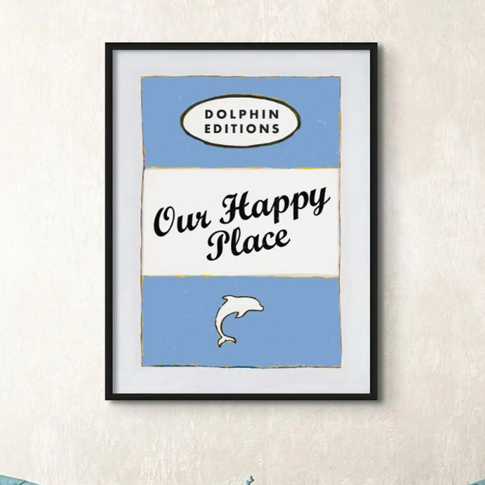 Framed art print of a vintage book cover with the title 'Our Happy Place' and a blue background