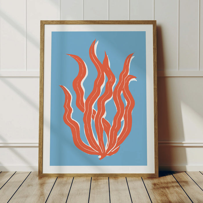 A lino cut style art print featuring abstract orange seaweed against a blue background, unframed.