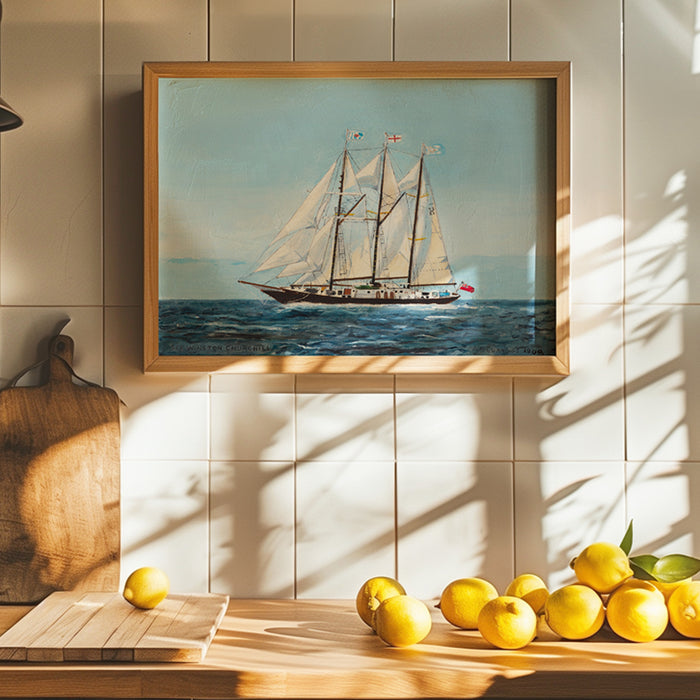 Framed artwork of a sailboat on a wall with lemons on a table below